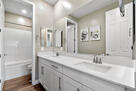 Dual Sinks in guest bath upstairs, full bath