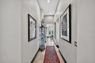 Halway leads to guest wing  at opposite end o