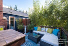 French doors open to this deck with bamboo vi