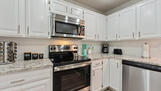 Built in microwave.  Full sized appliances.