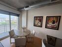 Beautiful artwork in dining area with balcony