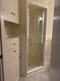 Shower in bathroom for primary bedroom