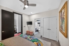 Smart TV and ceiling fan in Van Gogh suite