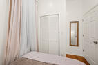 Queen bedroom with closet storage