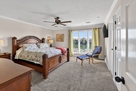 Primary bedroom with a king bed, overlooking 