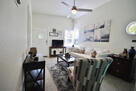 Another view of the living room leading outsi