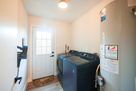Laundry with full sized washer and dryer