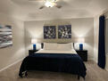 Master room with comfortable king-size bed