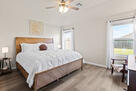 Furnished king primary bedroom