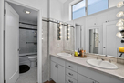The main level guest bathroom is well-lit w/ 