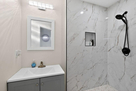 Full bathroom conveniently located near the s