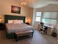 Master Bedroom with King bed and work desk.