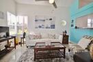 Living Room with large windows and a view of