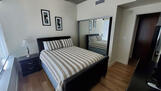 Bedroom with full closet