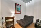 25th Floor Spire Condo Plus Den