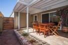 Side porch for reading, meals, entertaining
