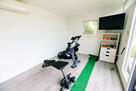Spin bike, weights and weight bench