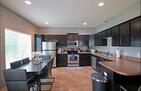 Large kitchen with dining table for 6