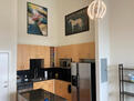 18 foot ceiling in kitchen with island