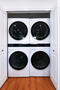 Double stacked washer and dryer.
