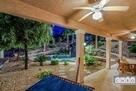 Covd patio overlooking pool area