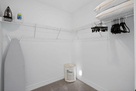 Bedroom 3: Large Walk-in Closet w/ Variety of