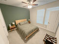 first floor bedroom with walk-in closet