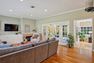 Living room looks out over covered patio