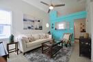 Another view of the living room leading to th