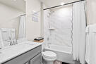Hall bath with tub and shower