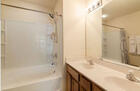 Master Bathroom That Features His & Her Sinks