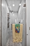 Oversized marble shower with waterfall and bo