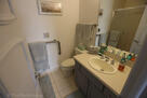 En suite primary bath with walk-in shower.