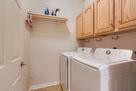 Laundry Room with Full Size Washer and Dryer