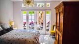 Your queen size bed lit by your Zen Garden