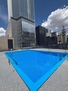 Community pool with downtown view