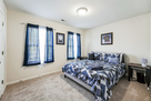 Secondary bedroom with closet, extra sheets i