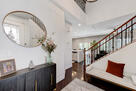 hallway featuring dark hardwood floors