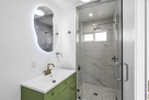Sleek, spa-like bathroom with contemporary fi