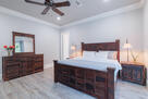 Primary suite with elegant furnishings