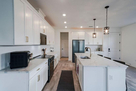 Modern Kitchen w/ View of Garage Entrance