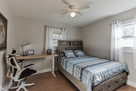 bedroom #3 with queen bed and working station