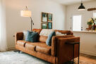 Sink into comfort on the leather sofa.