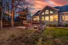 Beautiful backyard with propane firepit, stri