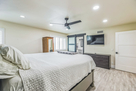 Primary bedroom with TV