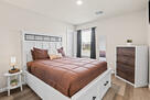Furnished queen bedroom