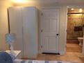 Looking towards the smaller closet & bathroom