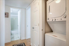 New Stacked Washer and Dryer in closet by bac