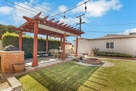 Backyard patio.  Fan, lighting, pull down sha