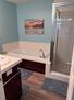 Master bath with jacuzzi tub and walk-in show